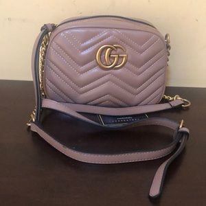 Monogrammed logo bag; not authentic